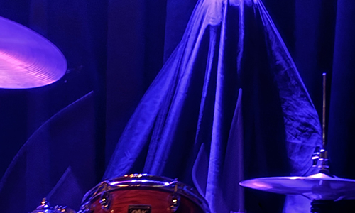 Drummer dresses as a ghost